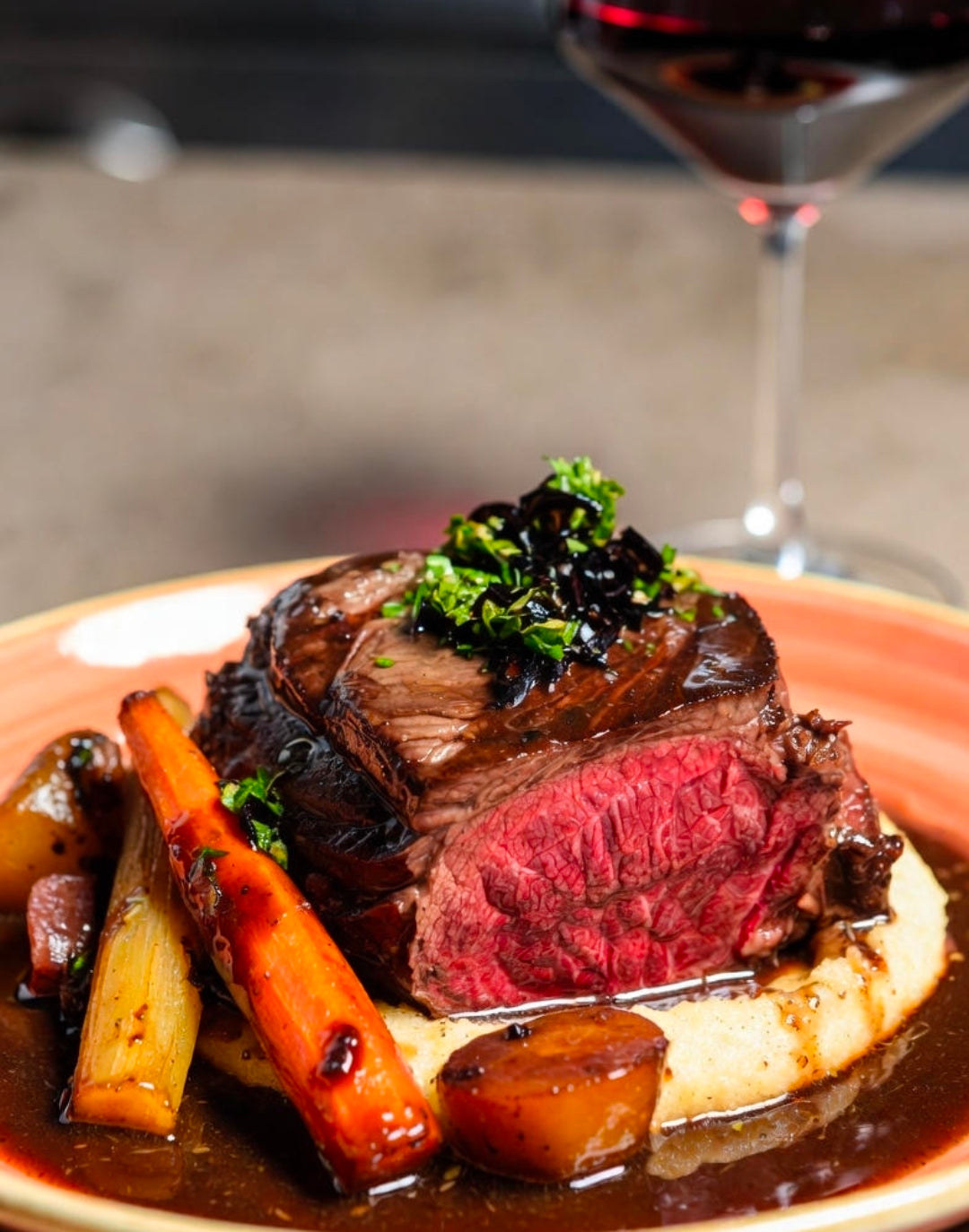 Red-Wine-Braised Beef Chuck with Winter Roots and Black Garlic Jus